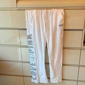 Pink brand sweatpants.  White . Medium